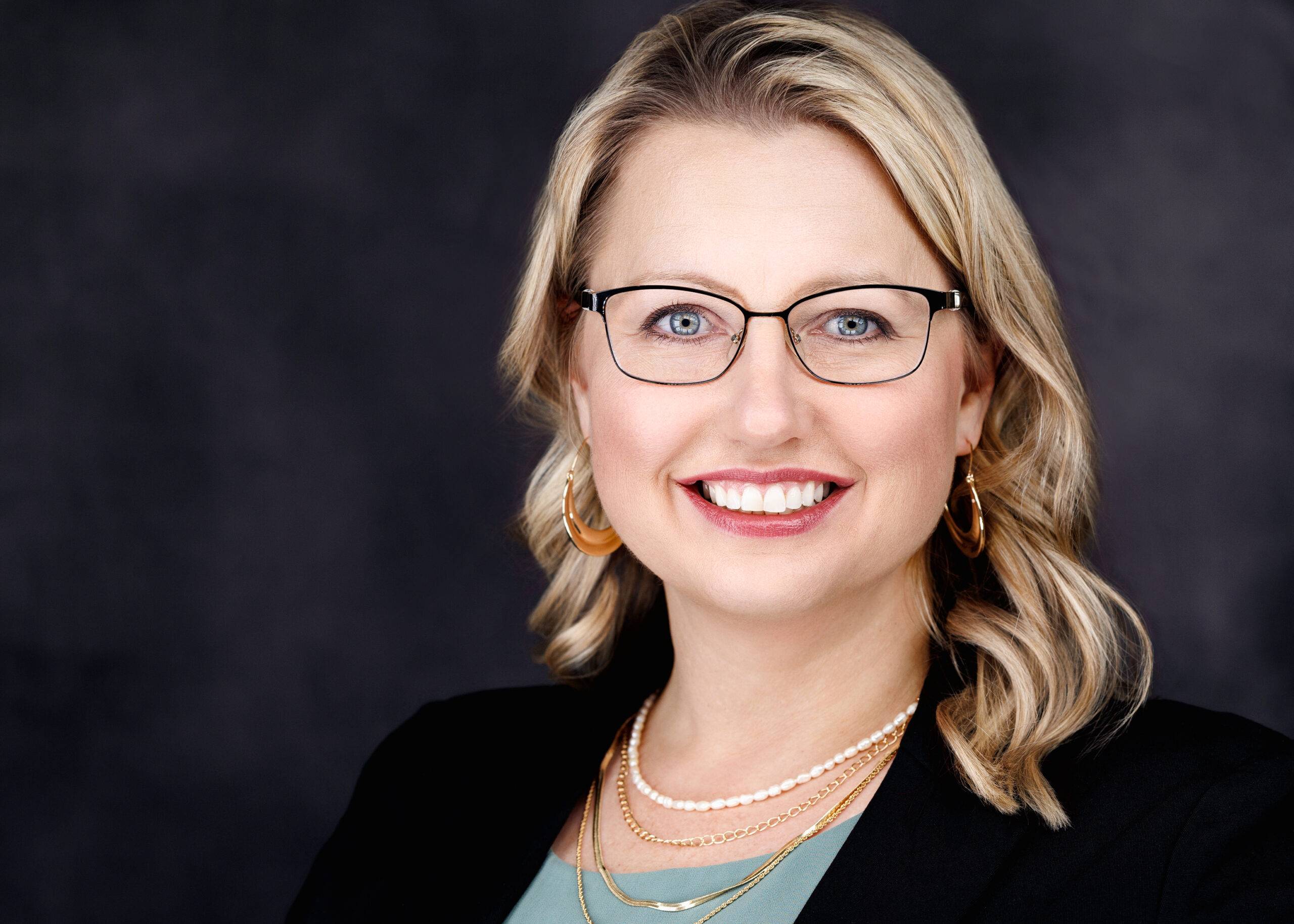 Headshot of Regional Design Manager at Interior Logic Group,  Jessica Sledge. Photographed by Ludeman Photographic (https://ludemanphotographic.com)