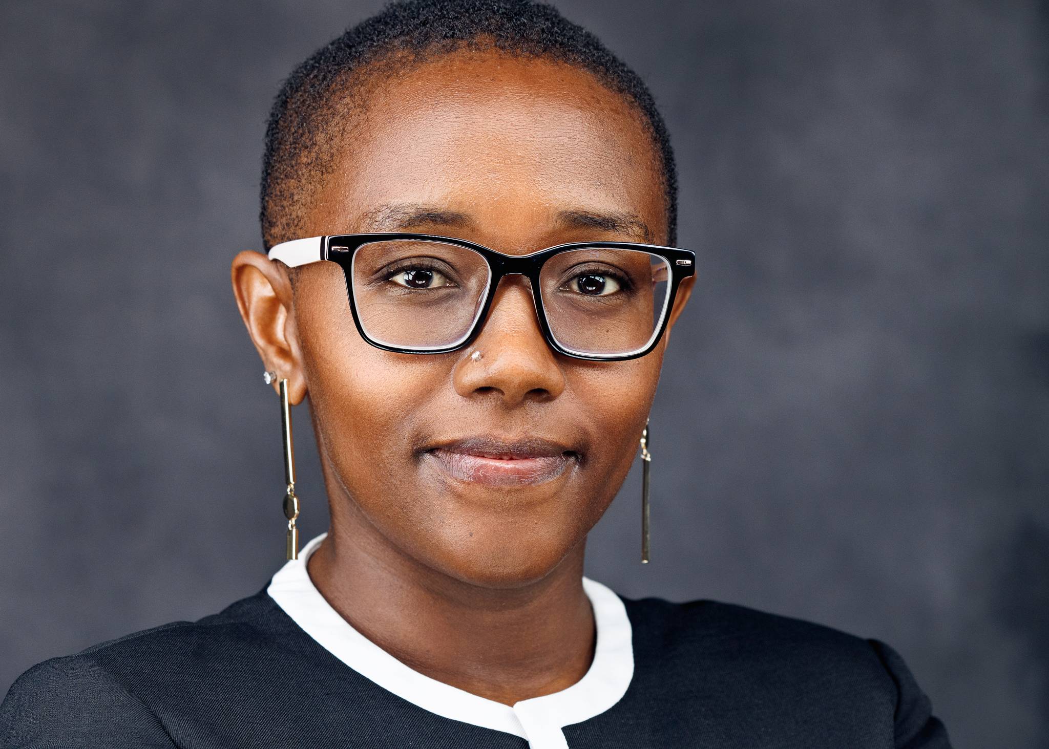 Headshot of Executive Pauling Mwangi. Photographed by Ludeman Photographic (https://ludemanphotographic.com)